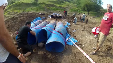 Man crossing tunnel in of mud Stock-Footage 55439437