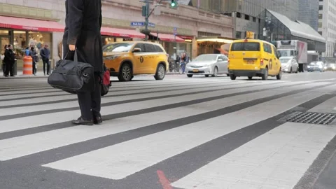 Man on the crosswalks Stock Footage 130847955