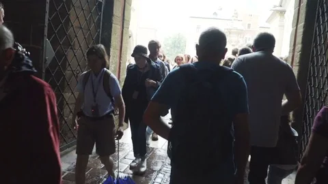 The man in the crowd stream, antique architecture. queue Stock Footage 82092199