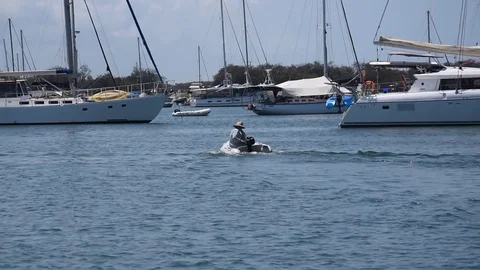 Man crusing on small inflatable boat Stock Footage 81931582