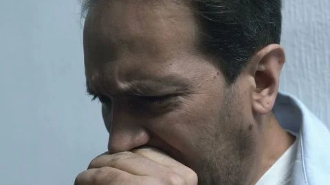 Man crying in despair after receiving bad news, shocking event, personal tragedy Stock Footage 119298675