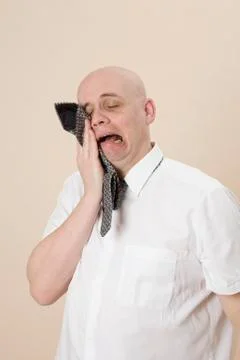 A man crying into his tie Stock Photos