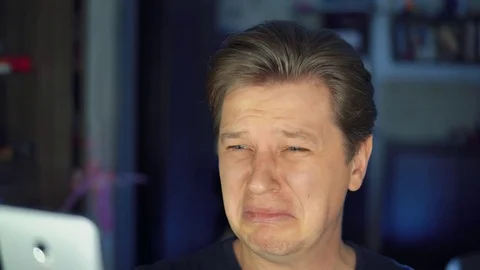 Man crying, mobile phone Stock Footage 84564559