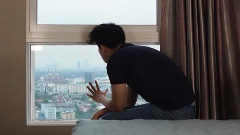 Man crying at the window and walk away Stock Footage 101720839