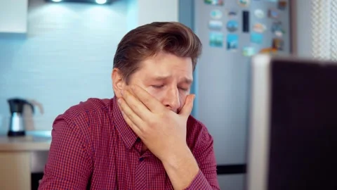 Man crying working at the computer Stock Footage 145140383
