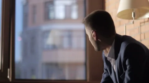 Man with Cup of Cofee Typing a Message Using Mobile Phone at Evening 스톡 동영상 64254805