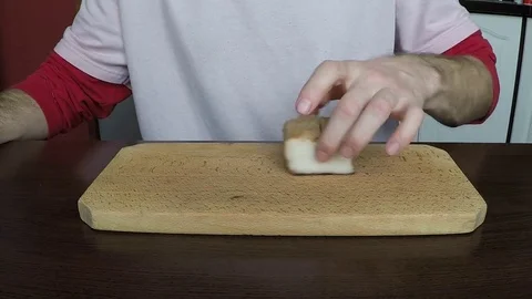 Man cut the bacon Stock Footage 70207892