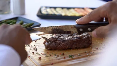 Man cut BBQ Stock Footage 128442013