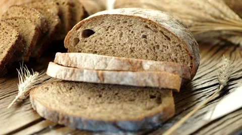 Man cut black bread. Stock Footage 59757259