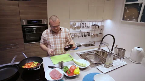 Man Cut the Eggplant on Board Stock Footage 64714037