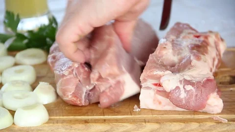 Man cut fresh meat Stock Footage 76193596