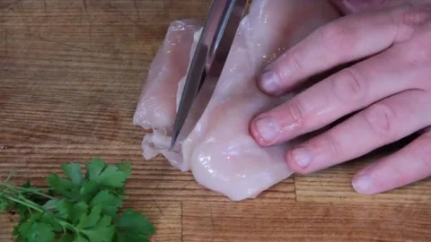 Man cut fresh meat, Stock Footage 76444741