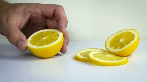 Man cut lemon slice Stock Footage 74658132