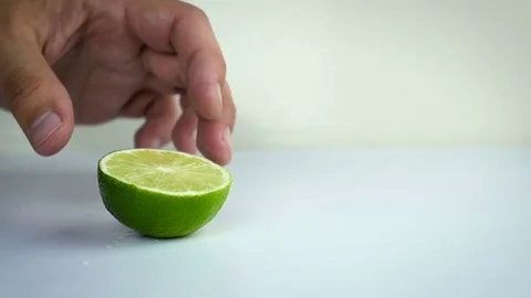 Man cut lime slice Stock Footage 74658082