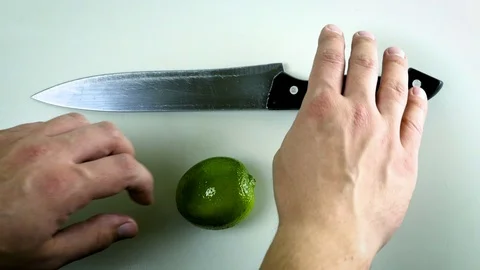 Man cut lime slice Stock Footage 74658501