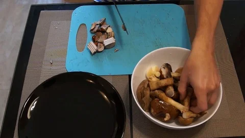Man cut mushrooms Stock Footage 80189700