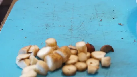 Man cut mushrooms Stock Footage 80189794