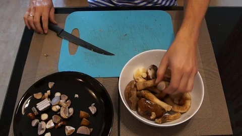 Man cut mushrooms Stock Footage 80248886