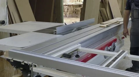 Man cuts the board on a circular loom Stock Footage 60567247