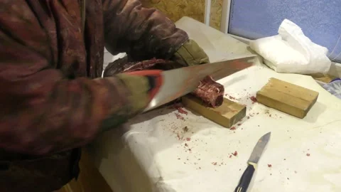 A man cuts a deer carcass into pieces.  Healthy food concept 스톡 동영상 146004368