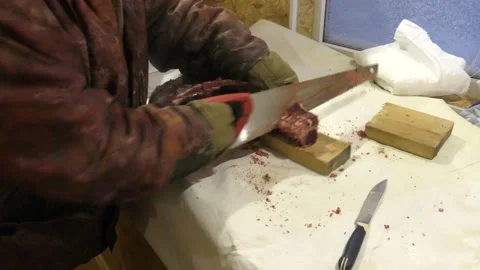 A man cuts a deer carcass into pieces.  Healthy food concept Stock Footage 146004827