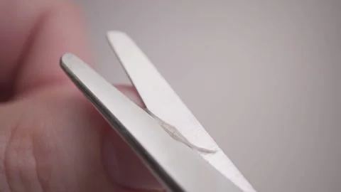 Man cuts his fingernails with scissors. Close-up Stock Footage 146782009