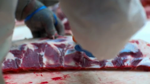 Man cuts meat with a knife Video stock 93264936