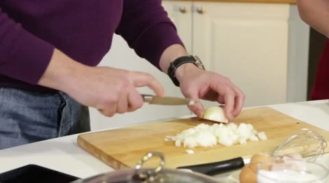 Man cuts onion Stock Footage 49783573