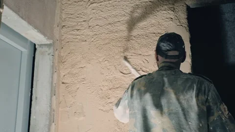 A man cuts paving slabs without protective equipment 2 Stock Footage 302777912