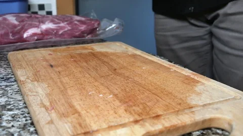 A man cuts the pork Stock Footage 101202732