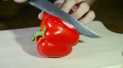 The man cuts red pepper Video stock 34645299