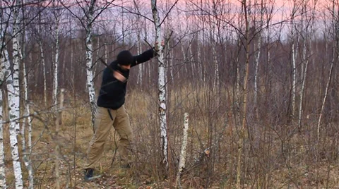 The man cuts a tree Stock Footage 36910500
