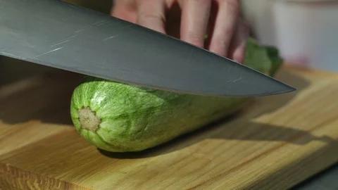 Man cuts vegetables 動画素材 93805815