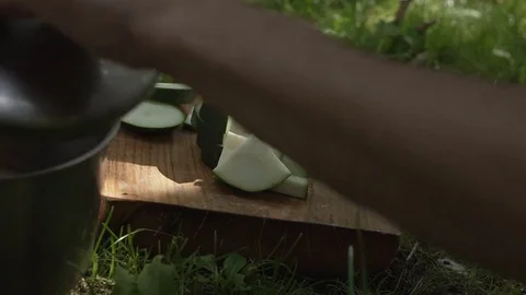 Man cuts zucchini Stock Footage 80242386