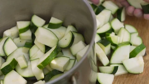 Man cuts zucchini with a knife hd 스톡 동영상 80243530