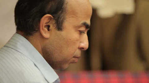 Man cuttin a texture layer with scissors Stock Footage 31443088