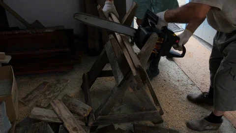 Man is cutting boards and guy is helping him 스톡 동영상 80193736