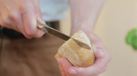 Man cutting bread Stock Footage 41278758