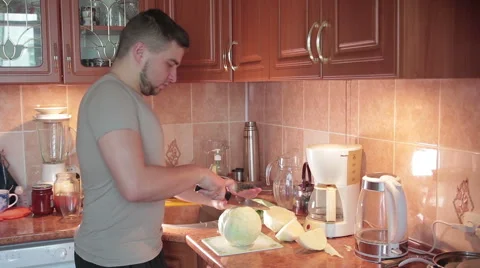 Man cutting cabbage Stock Footage 61492360