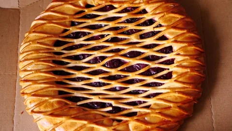 Man cutting cherry pie. Stock Footage 70671765