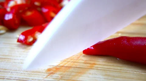 Man Cutting Chili on Cutting Board with Ceramic White Knife - Macro Close Up Stock Footage 59852935