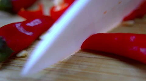 Man Cutting Chili on Cutting Board with Ceramic White Knife - Macro Close Up Stock Footage 59853284