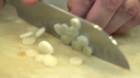 Man cutting chives, close up shot Stock Footage 11358069