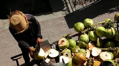 Man cutting a Coconut Video stock 12169450