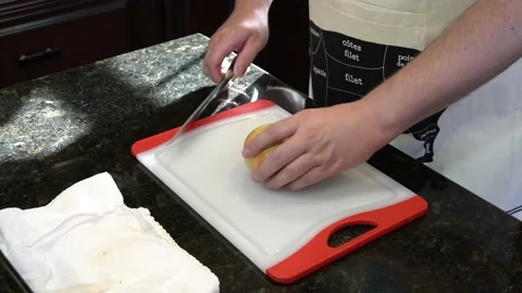 Man Cutting Food In A Kitchen Stock Footage 137267422