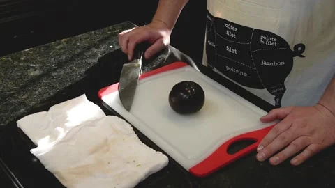 Man Cutting Food In A Kitchen Video stock 137267970