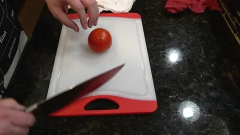 Man Cutting Food In A Kitchen Video stock 137268649