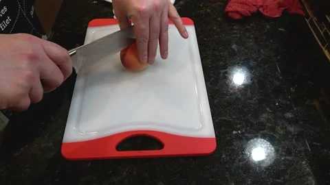 Man Cutting Food In A Kitchen Video stock 137268968