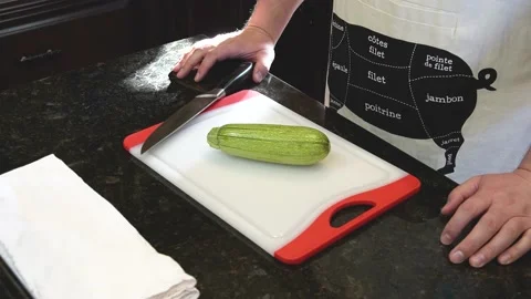 Man Cutting Food In A Kitchen Stock Footage 137269277