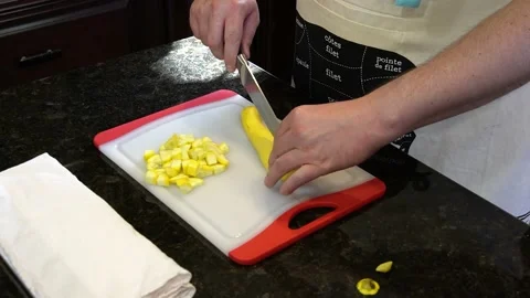 Man Cutting Food In A Kitchen Video stock 137269322